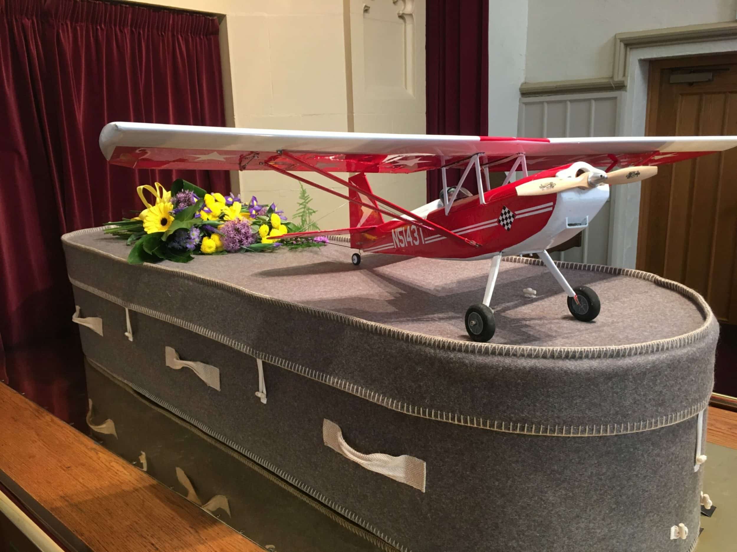 Fabric coffin with a plane on