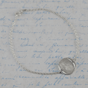 Fingerprint bracelet on silver chain